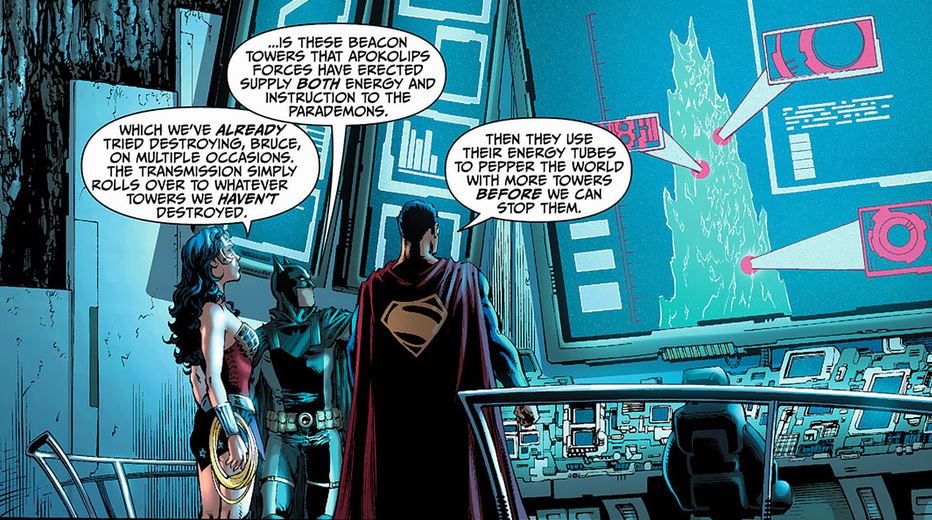batman talking to superman and wonder woman in the batcave